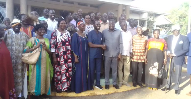 From left to right, in the middle blue clothe, Mrs. Anyang Nyong'o' Second right middle blue clothe Hon Peter Nyong'o'o, second right, Alfred Okwonga, Gulu City Mayor, third right in white shut and Kaki trouser, Chief Justice Owiny Dollo, far right Amb Olara Otunnu, in doted pink long sleep dress